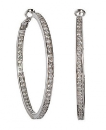 Dazzling round-cut cubic zirconia (2 ct. t.w.) lines every side of these gorgeous CRISLU hoop earrings set in sterling silver with a platinum finish. Approximate diameter: 1-3/4 inches. Dazzling round-cut cubic zirconia (2 ct. t.w.) lines every side of these gorgeous CRISLU hoop earrings set in sterling silver with a platinum finish. Approximate diameter: 1-3/4 inches.