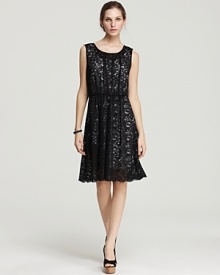 Dark yet delicate, this DKNY dress pairs all-over lace with a feminine silhouette for a look brimming with effortless romance. Team with pearls for head-to-heel polish. Dark yet delicate, this DKNY dress pairs all-over lace with a feminine silhouette for a look brimming with effortless romance. Team with pearls for head-to-heel polish.