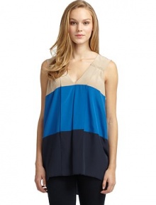 THE LOOKColorblock designAllover pleated constructionV-neck THE FITAbout 28 from shoulder to hemTHE MATERIALSilkCARE & ORIGINMachine washImportedModel shown is 5'8 (172½cm) wearing US size Small. THE LOOKColorblock designAllover pleated constructionV-neck THE FITAbout 28 from shoulder to hemTHE MATERIALSilkCARE & ORIGINMachine washImportedModel shown is 5'8 (172½cm) wearing US size Small.