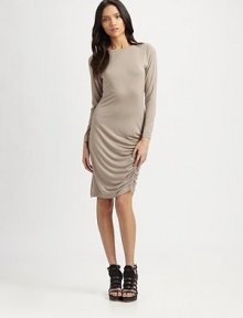 Concluded with a plunging scoopback, this elegant jersey boatneck has long dolman sleeves and a ruched, asymmetrical hem. BoatneckLong dolman sleevesRuched, asymmetrical hemAbout 18 from natural waist96% modal/4% spandexDry cleanMade in USAModel shown is 5'10 (177cm) wearing US size Small. Concluded with a plunging scoopback, this elegant jersey boatneck has long dolman sleeves and a ruched, asymmetrical hem. BoatneckLong dolman sleevesRuched, asymmetrical hemAbout 18 from natural waist96% modal/4% spandexDry cleanMade in USAModel shown is 5'10 (177cm) wearing US size Small.