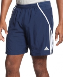 Man on the run! Whether you're going for a leisurely jog or an intense miles-long workout, these adidas running shorts featuring Climalite technology will keep you dry and comfortable.