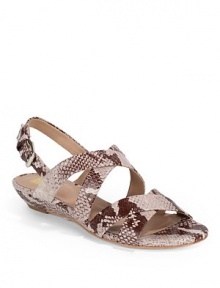 THE LOOKStrappy snakeskin printed leatherAdjustable ankle strapCone stud accentsPadded insoleSelf-covered wedge, 1½ (40mm)THE MATERIALLeather upperLeather lining and soleORIGINImported