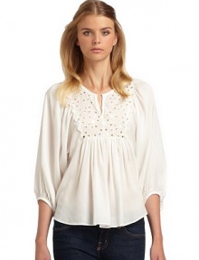 THE LOOKRound split necklineThree-quarter length dolman sleevesCutout and mirrored accents Gathered details THE FITAbout 26 from shoulder to hemTHE MATERIALRayonCARE & ORIGINDry cleanImportedModel shown is 5'9 (175cm) wearing US size 4. THE LOOKRound split necklineThree-quarter length dolman sleevesCutout and mirrored accents Gathered details THE FITAbout 26 from shoulder to hemTHE MATERIALRayonCARE & ORIGINDry cleanImportedModel shown is 5'9 (175cm) wearing US size 4.