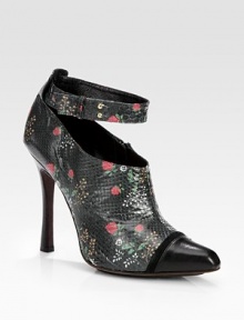 Luxe python takes on a flirty floral print in this ankle-strap silhouette, topped with a leather and suede point toe. Stacked heel, 4½ (115mm)Python upperLeather point toe with suede trimSide zip and adjustable ankle strapLeather lining and soleMade in ItalyThis style runs small. We recommend ordering one half size up for a standard fit. Luxe python takes on a flirty floral print in this ankle-strap silhouette, topped with a leather and suede point toe. Stacked heel, 4½ (115mm)Python upperLeather point toe with suede trimSide zip and adjustable ankle strapLeather lining and soleMade in ItalyThis style runs small. We recommend ordering one half size up for a standard fit.