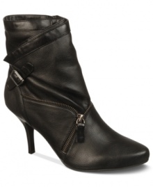 The perfect finishing touch. Zigzagging zippers add tough-girl intrigue to the Wolfe booties by Fergalicious. The perfect finishing touch. Zigzagging zippers add tough-girl intrigue to the Wolfe booties by Fergalicious.