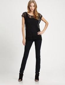 A sheer lace layering essential, slightly boxy and trimmed with fringe at the hem and fitted camisole underneath.ScoopneckShort sleevesCamisole includedPullover styleAbout 28 from shoulder to hem72% cotton/28% nylonDry cleanMade in USAModel shown is 5'9 (175cm) wearing US size Small. A sheer lace layering essential, slightly boxy and trimmed with fringe at the hem and fitted camisole underneath.ScoopneckShort sleevesCamisole includedPullover styleAbout 28 from shoulder to hem72% cotton/28% nylonDry cleanMade in USAModel shown is 5'9 (175cm) wearing US size Small.