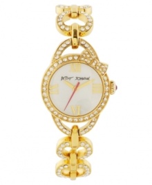 A gem of a timepiece you will love to love, from Betsey Johnson. Crafted of gold tone stainless steel heart-shaped linked bracelet with set crystal accents and round case. Bezel embellished with crystal accents and sculpted bow. White mother-of-pearl dial features applied gold tone Roman numerals at three, six, nine and twelve o'clock, gold tone hour and minute hands, signature fuchsia second hand and logo at twelve o'clock. Quartz movement. Water resistant to 30 meters. Two-year limited warranty. A gem of a timepiece you will love to love, from Betsey Johnson. Crafted of gold tone stainless steel heart-shaped linked bracelet with set crystal accents and round case. Bezel embellished with crystal accents and sculpted bow. White mother-of-pearl dial features applied gold tone Roman numerals at three, six, nine and twelve o'clock, gold tone hour and minute hands, signature fuchsia second hand and logo at twelve o'clock. Quartz movement. Water resistant to 30 meters. Two-year limited warranty.