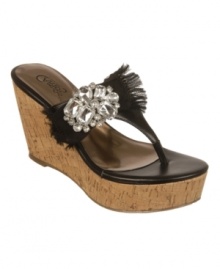 Frayed sparkle is most delightful. Carlos by Carlos Santana's Sparkly wedge thong sandals combine the structured shine of a rhinestone pendant with the casual ease of frayed fabric for a bow detail that's one of a kind. Frayed sparkle is most delightful. Carlos by Carlos Santana's Sparkly wedge thong sandals combine the structured shine of a rhinestone pendant with the casual ease of frayed fabric for a bow detail that's one of a kind.