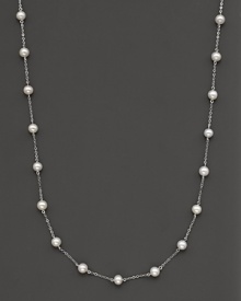 Beaded 14 Kt. white gold necklace with fresh water pearl stations. Beaded 14 Kt. white gold necklace with fresh water pearl stations.
