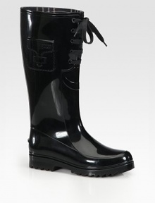 Polished rainy-weather essential updated by a lovely lace-up front. Shaft, 13 Leg circumference, 15 Rubber upper Leather lining Rubber sole Padded insole Made in ItalyOUR FIT MODEL RECOMMENDS ordering true whole size; ½ sizes should order the next whole size up. Polished rainy-weather essential updated by a lovely lace-up front. Shaft, 13 Leg circumference, 15 Rubber upper Leather lining Rubber sole Padded insole Made in ItalyOUR FIT MODEL RECOMMENDS ordering true whole size; ½ sizes should order the next whole size up.