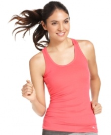 Stay cool and comfortable while you get in shape with this essential tank top from Puma. A built-in shelf bra guarantees support while a hint of stretch promises maximum ease of movement. Stay cool and comfortable while you get in shape with this essential tank top from Puma. A built-in shelf bra guarantees support while a hint of stretch promises maximum ease of movement.