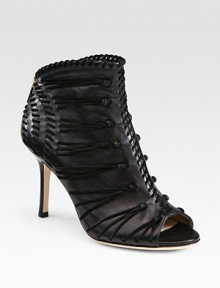 Elaborate suede stitching and an exposed back zipper embolden this leather peep toe ankle boot. Stacked heel, 3½ (90mm)Leather and suede upperBack zipperPeep toeLeather lining and solePadded insoleMade in Italy Elaborate suede stitching and an exposed back zipper embolden this leather peep toe ankle boot. Stacked heel, 3½ (90mm)Leather and suede upperBack zipperPeep toeLeather lining and solePadded insoleMade in Italy
