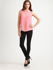 Woven crepe lightens this sleeveless essential styled with bound cutouts at the shoulder and back.Point collarSleevelessConcealed button-down placketShirttail hemAbout 26 from shoulder to hem55% viscose/45% rayonDry clean or hand washImportedModel shown is 5'9 (175cm) wearing US size 4. Woven crepe lightens this sleeveless essential styled with bound cutouts at the shoulder and back.Point collarSleevelessConcealed button-down placketShirttail hemAbout 26 from shoulder to hem55% viscose/45% rayonDry clean or hand washImportedModel shown is 5'9 (175cm) wearing US size 4.