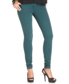 A fall must-have, these GUESS skinny jeans feature a teal wash that hits the colored-denim trend right on the mark! A fall must-have, these GUESS skinny jeans feature a teal wash that hits the colored-denim trend right on the mark!