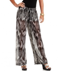 Slide into the fiercest pants of the season! GUESS? combines snakeskin print chiffon with a voluminous silhouette -- and creates a pair of palazzo pants that's illusion-style du jour! Slide into the fiercest pants of the season! GUESS? combines snakeskin print chiffon with a voluminous silhouette -- and creates a pair of palazzo pants that's illusion-style du jour!