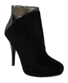 Leave an impression they'll never forget. With metallic accents and revealing cutaways behind the ankle, the zippered Alfreda booties by GUESS are a sassy must-have. Leave an impression they'll never forget. With metallic accents and revealing cutaways behind the ankle, the zippered Alfreda booties by GUESS are a sassy must-have.