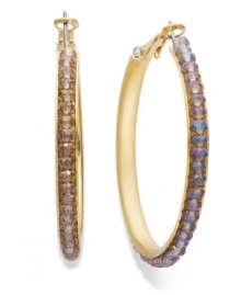 Looking for something sweet? Get your fix with these non-traditional hoop earrings from c.A.K.e. by Ali Khan. Crafted in gold tone mixed metal, hoops feature pistachio glass beads. Approximate diameter: 2 inches. Looking for something sweet? Get your fix with these non-traditional hoop earrings from c.A.K.e. by Ali Khan. Crafted in gold tone mixed metal, hoops feature pistachio glass beads. Approximate diameter: 2 inches.