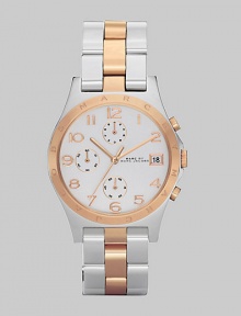 A classic chronograph dial with rose gold accents and bracelet link strap.Quartz movement Water resistant to 3 ATM Logo engraved rose gold bezel Light silver chronograph dial Arabic numeral hour markers Date display at 3 o'clock Second hand Stainless steel and rose gold link bracelet, 18mm, (.71) Imported A classic chronograph dial with rose gold accents and bracelet link strap.Quartz movement Water resistant to 3 ATM Logo engraved rose gold bezel Light silver chronograph dial Arabic numeral hour markers Date display at 3 o'clock Second hand Stainless steel and rose gold link bracelet, 18mm, (.71) Imported