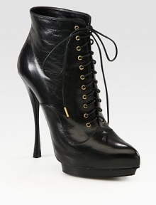 Add some edge to your look with this laced shape of buttery leather, on a towering heel and platform. Self-covered heel, 5¼ (130mm)Island platform, 1 (25mm)Compares to a 4¼ heel (110mm)Leather upperLeather lining and solePadded insoleMade in Italy Add some edge to your look with this laced shape of buttery leather, on a towering heel and platform. Self-covered heel, 5¼ (130mm)Island platform, 1 (25mm)Compares to a 4¼ heel (110mm)Leather upperLeather lining and solePadded insoleMade in Italy