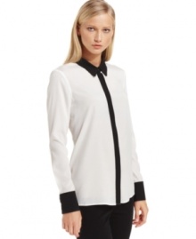 Contrasting trim gives this sleek, classic shirt silhouette a contemporary touch. By Calvin Klein. Contrasting trim gives this sleek, classic shirt silhouette a contemporary touch. By Calvin Klein.