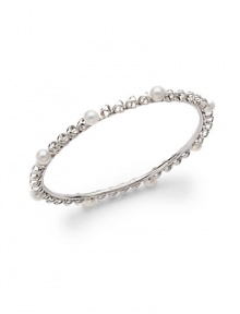 THE LOOKFaux pearl accents Cutout details Rhodium-plated sterling silver settingTHE MEASUREMENTWidth, about .25ORIGINImported THE LOOKFaux pearl accents Cutout details Rhodium-plated sterling silver settingTHE MEASUREMENTWidth, about .25ORIGINImported
