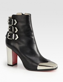 Buckle straps and a metal wing-tip modernize this expertly crafted ankle boot of supple leather. Lacquered heel, 3½ (90mm)Leather upper with metal wing-tipSide zip and buckle strapsLeather liningSignature red leather solePadded insoleMade in Italy Buckle straps and a metal wing-tip modernize this expertly crafted ankle boot of supple leather. Lacquered heel, 3½ (90mm)Leather upper with metal wing-tipSide zip and buckle strapsLeather liningSignature red leather solePadded insoleMade in Italy