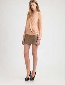 Subtle draping lends this modern silk silhouette a relaxed, romantic air.V-neckWrap front with hook-and-eye closureLong sleeves with button cuffsBack pleatAbout 22 from shoulder to hemSilkDry cleanImportedModel shown is 5'10 (177cm) wearing US size Small. Subtle draping lends this modern silk silhouette a relaxed, romantic air.V-neckWrap front with hook-and-eye closureLong sleeves with button cuffsBack pleatAbout 22 from shoulder to hemSilkDry cleanImportedModel shown is 5'10 (177cm) wearing US size Small.