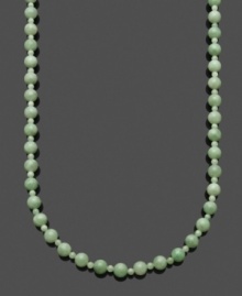 For a clean look in a pale color palette, add a simple strand of jade beads (8-14 mm). Clasp crafted in 14k gold. Approximate length: 18 inches.