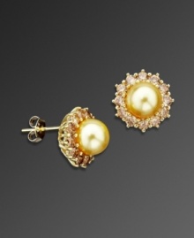 Frame your face with a golden burst of sunshine. These dazzling earrings by CRISLU feature glass champagne-colored pearls (8 mm) surrounded by sparkling cubic zirconias (4-1/5 ct. t.w.) set in gold over sterling silver. Frame your face with a golden burst of sunshine. These dazzling earrings by CRISLU feature glass champagne-colored pearls (8 mm) surrounded by sparkling cubic zirconias (4-1/5 ct. t.w.) set in gold over sterling silver.