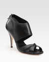 Rich leather fashioned in a shape that's at once classic and modern.Stacked heel, 3¾ (95mm) Back zip Leather lining and sole Padded insole Imported