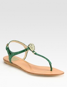 Rhinestone embellishment and an adjustable ankle strap define this exotic snake-print leather thong. Snake-print leather upperLeather lining and soleImportedOUR FIT MODEL RECOMMENDS ordering true size. 