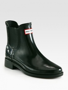 An ultra-protective rubber silhouette with side stretch panels for easy on and off access. Rubber heel, 1¼ (30mm)Rubber upper with stretch rubber panelsNylon liningRubber solePadded insoleImported An ultra-protective rubber silhouette with side stretch panels for easy on and off access. Rubber heel, 1¼ (30mm)Rubber upper with stretch rubber panelsNylon liningRubber solePadded insoleImported