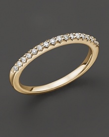 An elegant diamond ring in 14 Kt. yellow gold that can be worn stacked. An elegant diamond ring in 14 Kt. yellow gold that can be worn stacked.