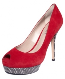 A gorgeous snake-covered platform and heel set the scene for the brightly colored upper of the Lucinda pumps by DKNY Bridge Collection. A gorgeous snake-covered platform and heel set the scene for the brightly colored upper of the Lucinda pumps by DKNY Bridge Collection.