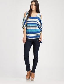 Give the bold shoulder in this striped scoopneck with open shoulders and poncho sleeves. ScoopneckOpen shouldersThree-quarter poncho sleeves96% rayon/4% spandexHand washMade in USAModel shown is 5'10 (177cm) wearing US size Small. Give the bold shoulder in this striped scoopneck with open shoulders and poncho sleeves. ScoopneckOpen shouldersThree-quarter poncho sleeves96% rayon/4% spandexHand washMade in USAModel shown is 5'10 (177cm) wearing US size Small.