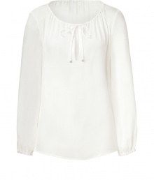 Stylish top in fine, ecru silk stretch blend - Classic tunic cut with round, gathered tie neck and cutout detail at chest - Long, billowy sleeves with elasticated cuffs - Easy, straight silhouette - Casually elegant, easily dressed up or down - Pair with cropped trousers, shorts or skinny denim and sandals or peep toe pumps Stylish top in fine, ecru silk stretch blend - Classic tunic cut with round, gathered tie neck and cutout detail at chest - Long, billowy sleeves with elasticated cuffs - Easy, straight silhouette - Casually elegant, easily dressed up or down - Pair with cropped trousers, shorts or skinny denim and sandals or peep toe pumps