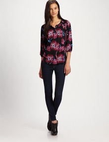Gorgeous florals highlight this breezy silk topper finished with a wide smocked yoke.Jewel necklineGathered three-quarter sleevesButton-down placketAbout 25 from shoulder to hem95% silk/5% spandexDry cleanMade in USA of imported fabric Gorgeous florals highlight this breezy silk topper finished with a wide smocked yoke.Jewel necklineGathered three-quarter sleevesButton-down placketAbout 25 from shoulder to hem95% silk/5% spandexDry cleanMade in USA of imported fabric