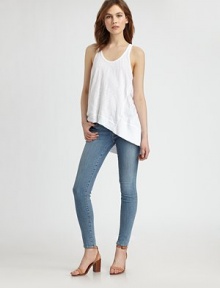Enlivened by an asymmetrical hi-low hem, this cotton scoopneck has a downtown-chic, cutout racerback. ScoopneckSleevelessAsymmetrical hi-low hemCutout racerbackCottonMachine washMade in USAModel shown is 5'10 (177cm) wearing US size Small. Enlivened by an asymmetrical hi-low hem, this cotton scoopneck has a downtown-chic, cutout racerback. ScoopneckSleevelessAsymmetrical hi-low hemCutout racerbackCottonMachine washMade in USAModel shown is 5'10 (177cm) wearing US size Small.