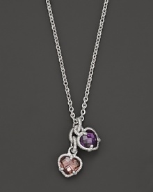 A twin heart necklace in pink and raspberry crystal framed in sterling silver. Designed by Judith Ripka. A twin heart necklace in pink and raspberry crystal framed in sterling silver. Designed by Judith Ripka.
