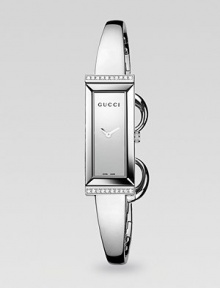 From the G-Frame Collection. A streamlined stainless steel timepiece with diamond and horsebit accents.Quartz movement Water resistant to 3 ATM Rectangular stainless steel case, 34mm x 14mm, (1.33 x .55) Sapphire crystal Diamonds along top and bottom case, 0.10 tcw Stainless steel bangle Jewelry clasp closure Made in Switzerland From the G-Frame Collection. A streamlined stainless steel timepiece with diamond and horsebit accents.Quartz movement Water resistant to 3 ATM Rectangular stainless steel case, 34mm x 14mm, (1.33 x .55) Sapphire crystal Diamonds along top and bottom case, 0.10 tcw Stainless steel bangle Jewelry clasp closure Made in Switzerland