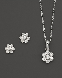 Young and glamorous: Mini diamond flower earrings and pendant necklace in white gold. Young and glamorous: Mini diamond flower earrings and pendant necklace in white gold.