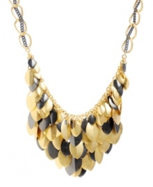 Cascading leaves in two-tone metallics look good whatever the season! Kenneth Cole New York's shimmery cluster necklace features leaf-shaped charms in gold and hematite-plated mixed metal. Approximate length: 17 inches +3-inch extender. Approximate drop: 2 inches. Cascading leaves in two-tone metallics look good whatever the season! Kenneth Cole New York's shimmery cluster necklace features leaf-shaped charms in gold and hematite-plated mixed metal. Approximate length: 17 inches +3-inch extender. Approximate drop: 2 inches.