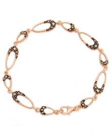 Add some glitter and glam to your look. Genevieve & Grace's pretty hammered link bracelet features sparkling marcasite in 18k rose gold over sterling silver. Approximate length: 7-1/2 inches. Add some glitter and glam to your look. Genevieve & Grace's pretty hammered link bracelet features sparkling marcasite in 18k rose gold over sterling silver. Approximate length: 7-1/2 inches.