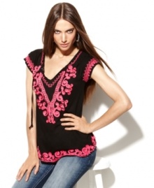 INC's embroidered tunic adds an air of relaxed glamour to any outfit! Subtle beading gives this top extra shine, too. INC's embroidered tunic adds an air of relaxed glamour to any outfit! Subtle beading gives this top extra shine, too.
