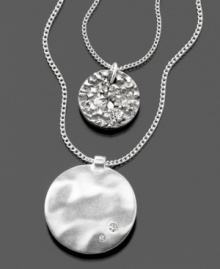 Emblematic style by Kenneth Cole New York. This beautiful two-strand pendant features crystal accents set in silvertone mixed metal. Approximate outer chain length: 18 inches + 3-1/2-inch extender. Approximate inner chain length: 16 inches. Approximate large pendant diameter: 1-3/4 inches. Approximate small pendant diameter: 1/2 inch. Emblematic style by Kenneth Cole New York. This beautiful two-strand pendant features crystal accents set in silvertone mixed metal. Approximate outer chain length: 18 inches + 3-1/2-inch extender. Approximate inner chain length: 16 inches. Approximate large pendant diameter: 1-3/4 inches. Approximate small pendant diameter: 1/2 inch.