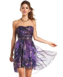 Breeze into the party in a dress designed to steal the spotlight. From the gorgeous metallic-treated print to the slight high-low hem, this frock is a chic yet timeless choice. Breeze into the party in a dress designed to steal the spotlight. From the gorgeous metallic-treated print to the slight high-low hem, this frock is a chic yet timeless choice.
