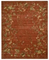 Exquisitely chic with an alluring vine and leaf motif, this area rug is hand tufted and hand carved from only the finest premium wool. Set against a persimmon-hued ground, it's expertly washed to lend the surface a handsome luster, texture and sheen.