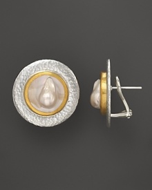 Modern button earrings in sterling silver and 24K yellow gold with Mabe pearl center. Modern button earrings in sterling silver and 24K yellow gold with Mabe pearl center.