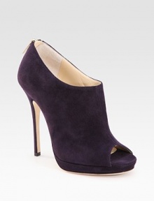 Especially sophisticated, this suede platform style has an exposed back zipper.Self-covered heel, 4¼ (110mm) Covered platform, ½ (15mm) Compares to a 3¾ heel (95mm) Peep toe Back zipper Leather lining and sole Padded insole Made in Italy Especially sophisticated, this suede platform style has an exposed back zipper.Self-covered heel, 4¼ (110mm) Covered platform, ½ (15mm) Compares to a 3¾ heel (95mm) Peep toe Back zipper Leather lining and sole Padded insole Made in Italy