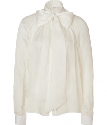 Classic ivory tie-neck silk blouse from Ferragamo -Add elegant refinement to your dress up looks with this lavish blouse - Billowy silhouette with tie-neckline, and draped back detail - Style with a pencil skirt, patterned tights, and a luxe tuxedo-inspired jacket Classic ivory tie-neck silk blouse from Ferragamo -Add elegant refinement to your dress up looks with this lavish blouse - Billowy silhouette with tie-neckline, and draped back detail - Style with a pencil skirt, patterned tights, and a luxe tuxedo-inspired jacket